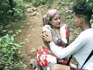 Tribal old auntie herself with a rich teenage boy for money! Desi forbidden sex